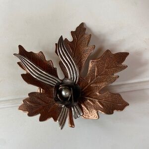 Vintage copper toned brooch